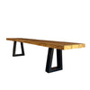 Wooden dining table with black metal legs on a white background