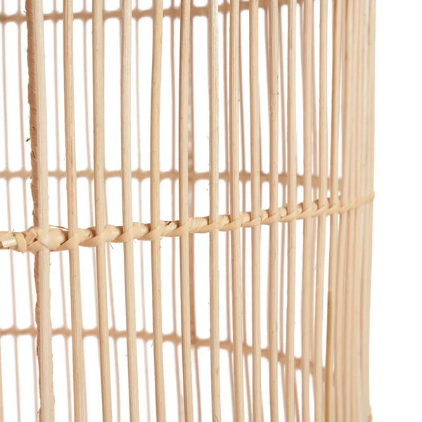 Close-up of a woven natural fiber screen on a white background