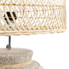 Wicker lamp with a textured base on a white background