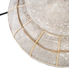 Close-up of a concrete and gold metal decorative object on a white background