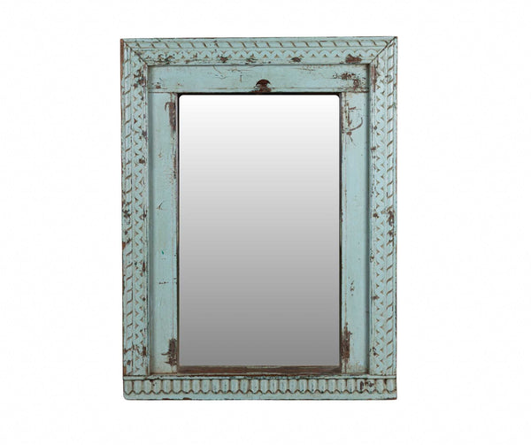 Vintage-style mirror with a weathered blue frame on a white background