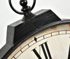 Close-up of a vintage clock with Roman numerals on a white background