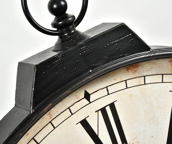 Close-up of a vintage clock with Roman numerals on a white background