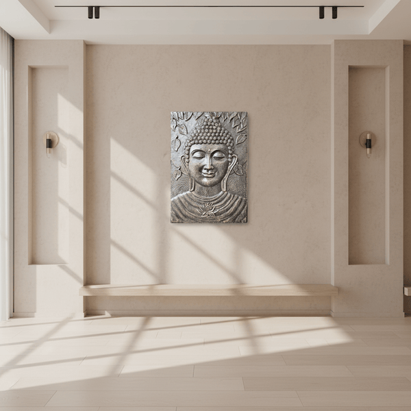Decorative wall art of a Buddha face on a beige wall in a minimalistic room.