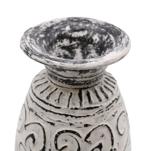 Decorative ceramic vase with intricate patterns on a white background