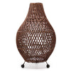 Woven brown lamp with a white background