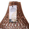 Rattan table lamp with a label on a white background