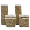 Set of four woven baskets with white bands on a white background