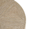 Close-up of a textured round rug with a natural fiber pattern on a white background