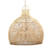 Woven rattan pendant light on a white background