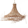 Woven rattan pendant light on a white background
