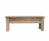 Wooden bench with intricate carvings on a white background