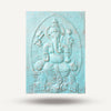 Decorative wall art with embossed design of a seated figure on an elephant, in light blue color.