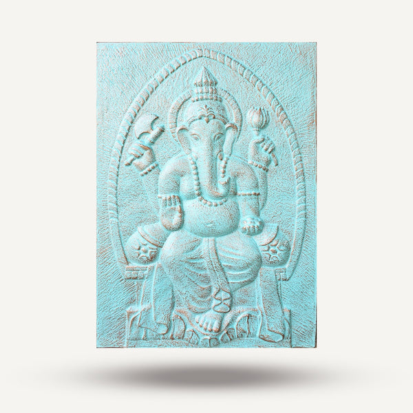Decorative wall art with embossed design of a seated figure on an elephant, in light blue color.